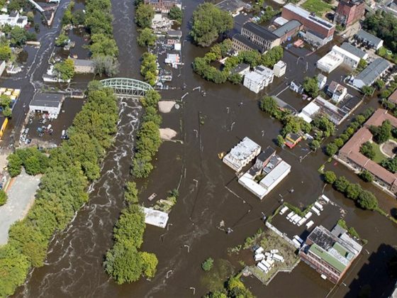 An aerial view of a flooded town.