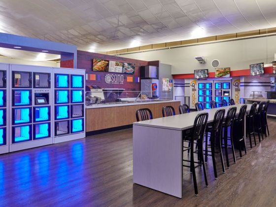 A seating area and food service counter in the Rutgers University-Camden Campus Dining Hall.