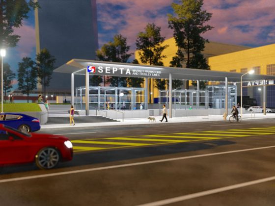 A rendering of the street-level entrance to SEPTA’s Market-Frankford and trolley lines. Pedestrians walk on the sidewalk in front of a large silver canopy with the SEPTA logo.